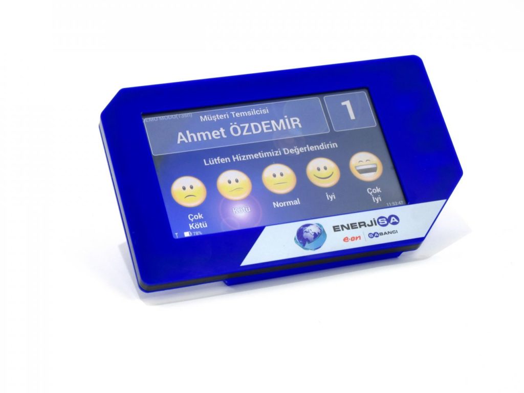 Customer feedback touchscreen terminal with satisfaction rating interface and Enerjisa branding